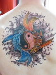 pisces-tattoo-with-yin-yang-design