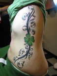 four-leaf-clover-tattoos-on-side-of-girls_0