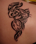 tribal-white-rabbit-watch-tattoo