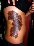 rose-ribs-tattoo