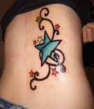 colorful-star-tattoo-design-for-girls-back-520x599