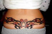 star-lower-back-tattoo-design-for-female-2011