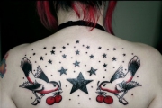women-star-tattoo-ideas-bird-and-fruit-tattoo