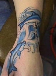 arm-dolphin-tattoo