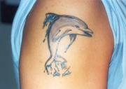 dolphin-jumping-tattoo-ideas-520x367