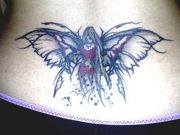 fairy-tattoos-on-side-of-stomach