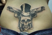 lower_back_tattoo_sexy_girls__wittily-cute-skull-guns-tat-too