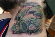 organic-skull-neck-tattoo