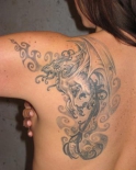 1325351557_77438361_dragon_tattoo_by_tikos