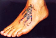 tatu-pero-noga